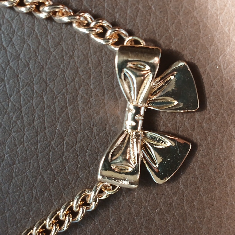 Elegant Gold Bow Necklace - Picture 2 of 7